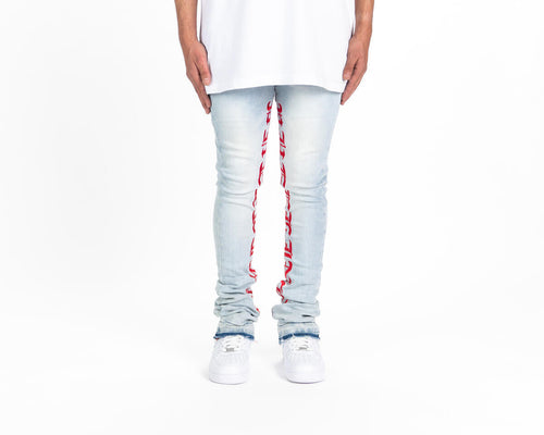 Pheelings AGAINST ALL ODDS FLARE STACK DENIM (LIGHT BLUE/RED)