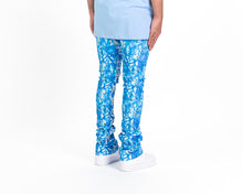 Load image into Gallery viewer, Pheelings AGAINST ALL ODDS FLARE STACK DENIM  (BLUE CAMO/WHITE)