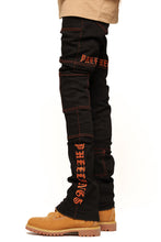 Load image into Gallery viewer, PHEELINGS DEFYING ODDS FLARE STACK DENIM (JET BLACK/ORANGE)