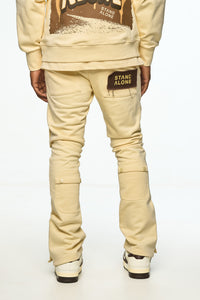 AOLOGNE LEAVE ME AOLOGNE CREAM STACK JOGGERS (CREAM)